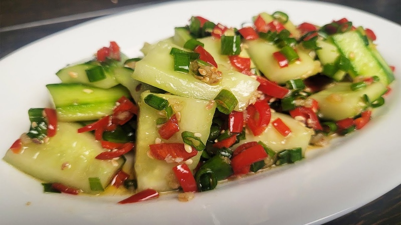 Cucumber salad. Салат из огурца перца кунжута. Закуска из огурцов с кунжутом. Соус с огурцом. Салат с редисом и огурцом.