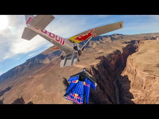 World First: Skydiver Hooks Onto a Plane In A Canyon!